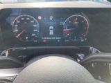 a picture of a dashboard of a car with a clock on it