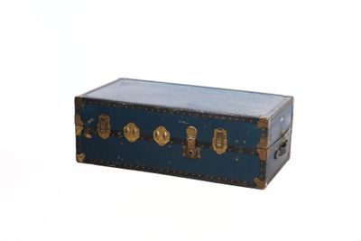 a blue suitcase with gold handles on a white background