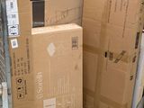 many boxes stacked on top of each other on a cart
