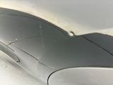 a close up of a car ' s front bumper