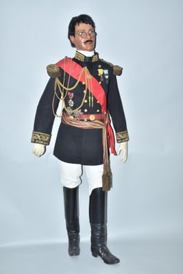 a doll of a man dressed in a military uniform