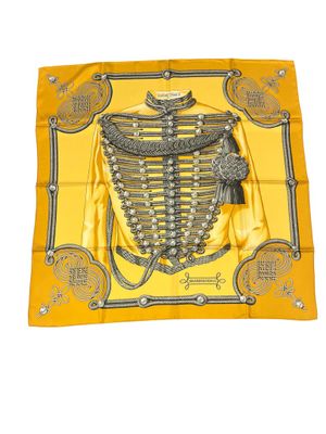 a yellow scarf with a skeleton on it