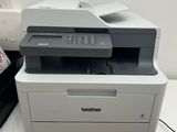 a printer that is sitting on top of a desk