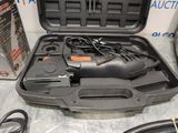 a tool in a case that is sitting on a table