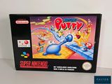 the box for the nintendo super mario game is sitting on a table