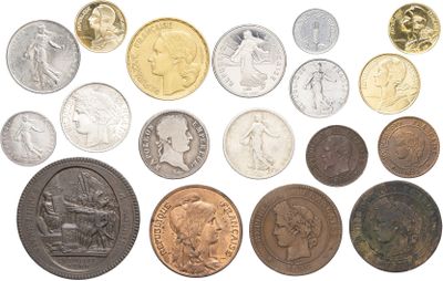 many different types of coins on this white background