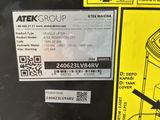 a black and yellow box with a sticker on it