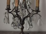 a small crystal chandelier that is on a table