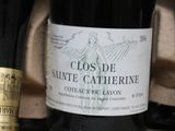a bottle of wine sitting next to a bottle of wine