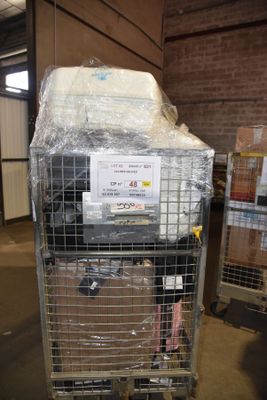 a cart with a mattress on top of it in a warehouse