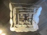 a light that is hanging from the ceiling in the room