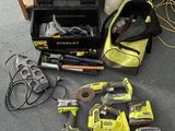 a lot of tools that are laying out on the floor