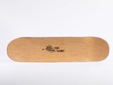 a skateboard that has a picture of a person on it