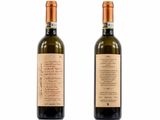 two bottles of wine are shown on a white surface