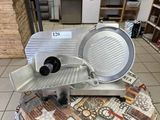 an image of a slicer on a table in a store