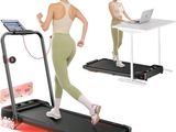 a woman that is running on a treadie