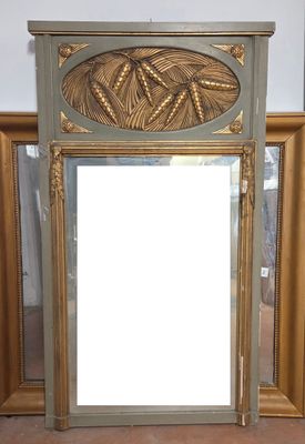 a mirror that is sitting on the floor in front of a mirror