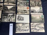 several old black and white photographs of people and buildings on a table
