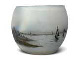 a white vase with a picture of boats on the water