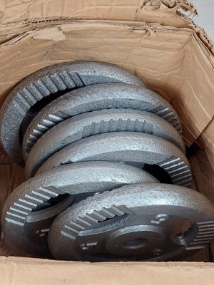 a cardboard box with a bunch of wheels inside of it