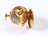 an image of a gold pocket watch on a white background