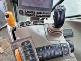 a control panel in the driver ' s seat of a truck