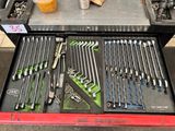 many tools in a tool box on the table