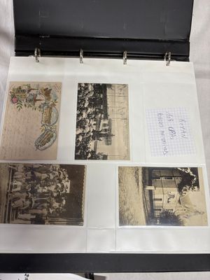 a black suitcase with pictures of people inside of it