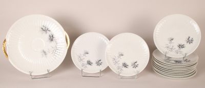 a lot of plates that are sitting on a table