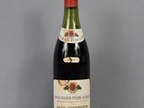 a bottle of wine that is sitting on a table
