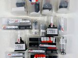 many different types of ink and ink cartridges in the package