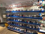 a large display of cell phones in a store