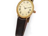 a close up of a wrist watch with roman numerals on it