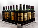 bottles of wine are lined up on a metal stand