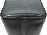 a close up of a black suitcase on a white background