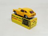 an image of a yellow toy car sitting on top of a box