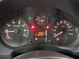 a close up of a car dashboard with a speedometer and gauges