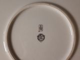a white plate with a black and white design on it