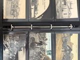 a black binder with pictures of people on it