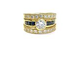 une image représentant une bague sertie d'un diamant et d'un saphir, sur fond blanc