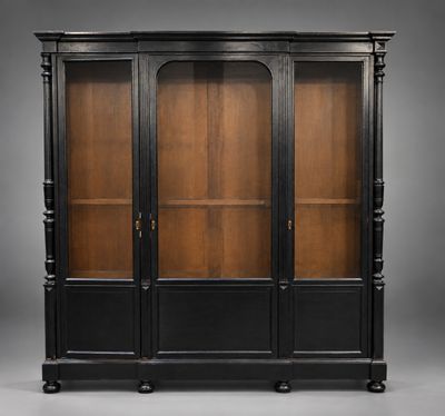 a black and wood display cabinet with glass doors
