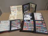 many different types of stamps on a table