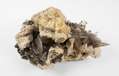 a close up of a piece of rock on a white surface