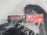 a plastic bag with a pair of scissors inside of it