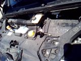 the engine of a car with the hood open and the hood open