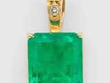 an emerald and diamond pendant