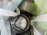 a bag with a water bottle inside of it