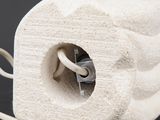 an image of a white object with a cord attached to it