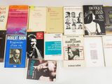 a lot of books that are on a table