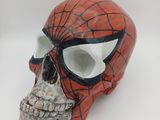spider - man skull with spider - man mask on white background